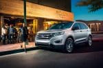 2018 Ford Edge SUV in night lights backgrounds