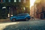 2018 Ford Escape blue color side view in city on road hd wallpaper