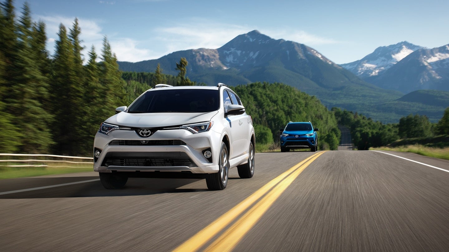 2019 Toyota RAV4 white color on highway front view 4k ultra hd wallpaper