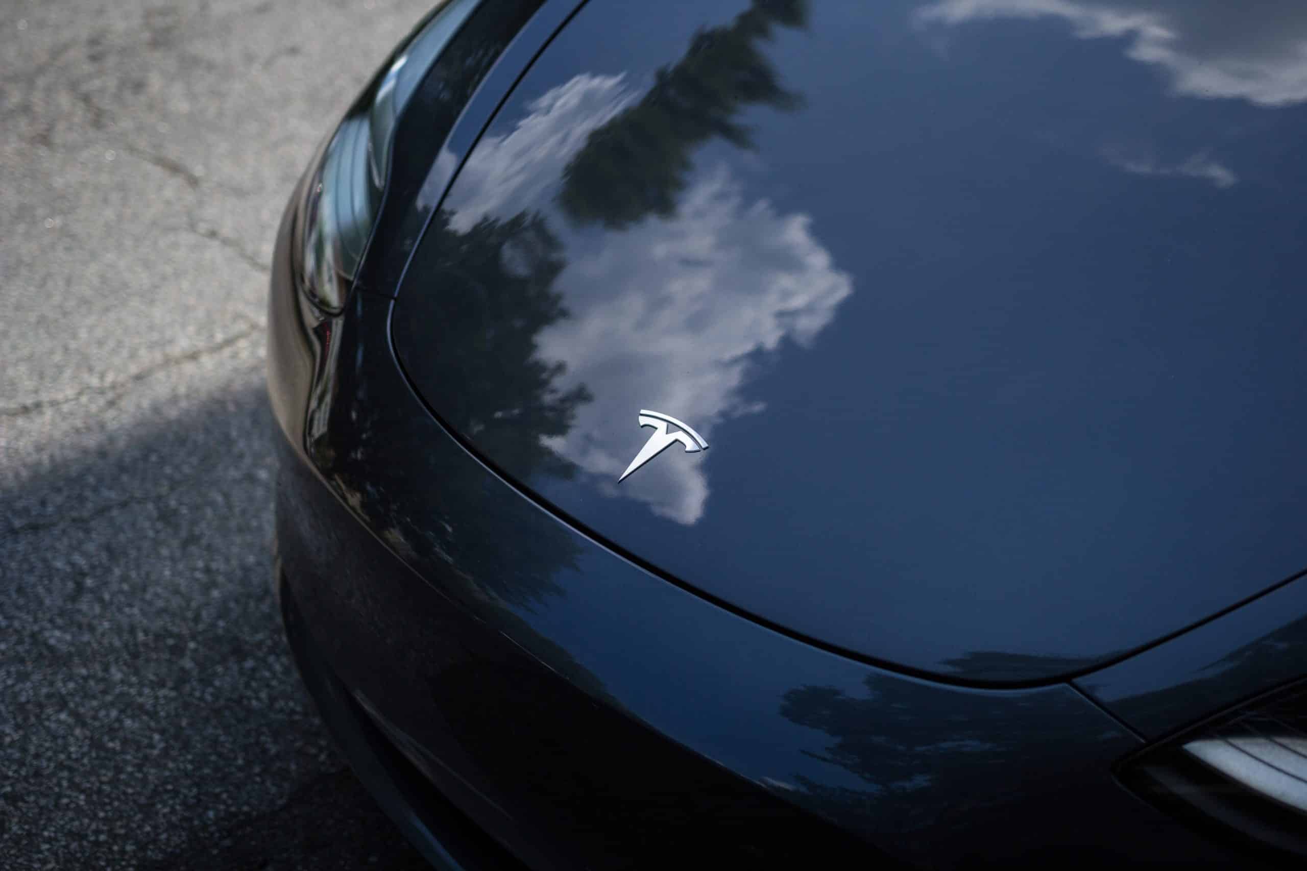 Tesla paint hood - Photo by Cam Bradford on Unsplash