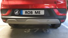 Stickers on Your Car: An Unintended Window to Your Life?